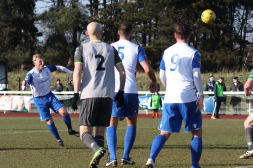 Enfields Ryan Blackman (L) shoots