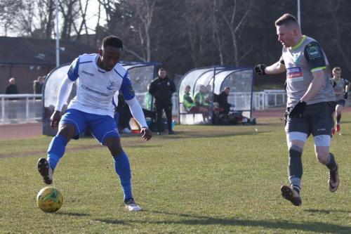 Enfields Ryan Blake (L) and Leatherheads Tom Richards