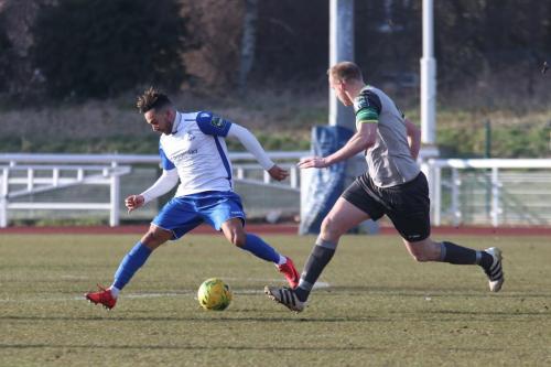 Enfields Tyler Campbell (L) and Leatherheads Lee Minshull