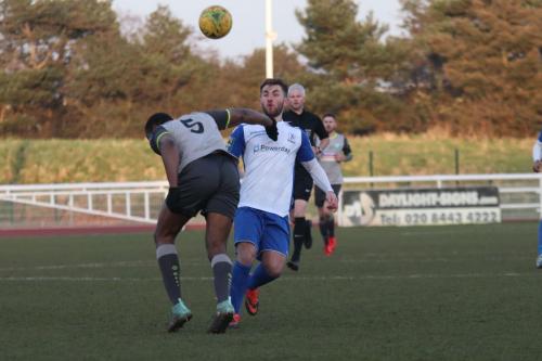 Leatherheads Jerry Nnamani (L) and Enfields Jack Hockney