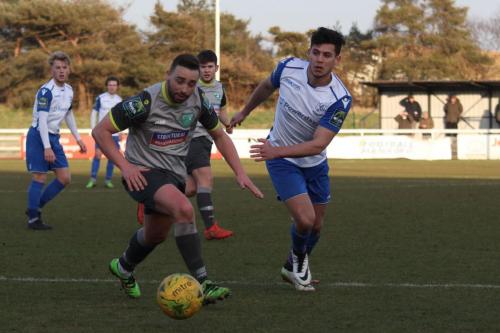 Leatherheads Sammy Moore (L) and Enfields Samir Bihmoutine