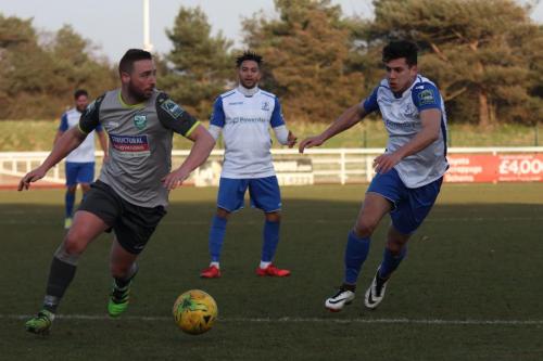 Leatherheads Sammy Moore and Enfields Samir Bihmoutine (R) and Tyler Campbell