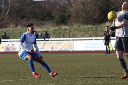 Leatherheads Sean Clohessy (R) blocks Tyler Campbells shot