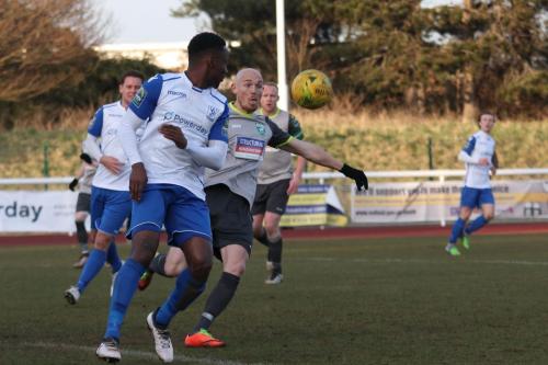 Leatherheads Sean Clohessy (grey) clears from Ryan Blake