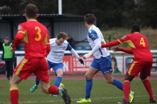 Enfields Aaron Grenn (white, L) and Sam Youngs and Needhams Callum Sturgess (3) and Jeremiah Kamanzi