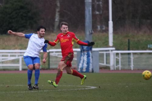 Enfields Mario Noto (L) and Needhams Callum Harrison