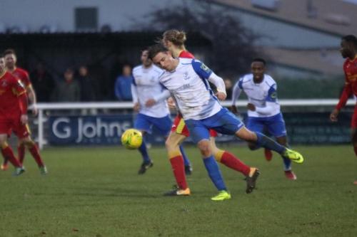 Enfields Sam Youngs  (white) challenges Keiran Morphew