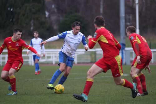 Enfields Sam Youngs and (L-R) Needhams Jack Simmons, Callum Sturgess and Dan Morphew