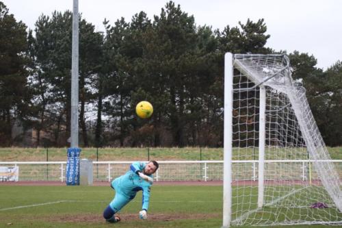 Needhams Danny Gay pushes Mario Notos free kick round the post29