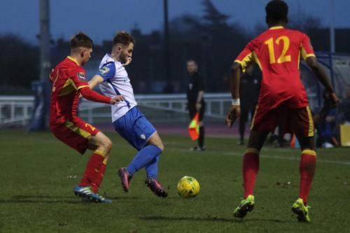 Needhams Jake Dye (L) and Brendan Ocran and Enfields Jack Hockney