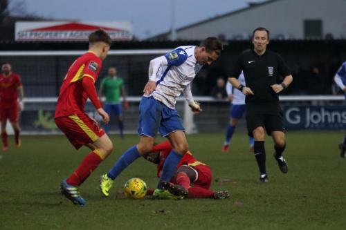 Needhams Jeremiah Kamanzi (R) and Jake Dye and Enfields Sam Youngs