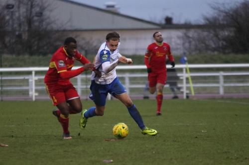 Needhams Jeremiah Kamnazi (red) challenges Sam Youngs31