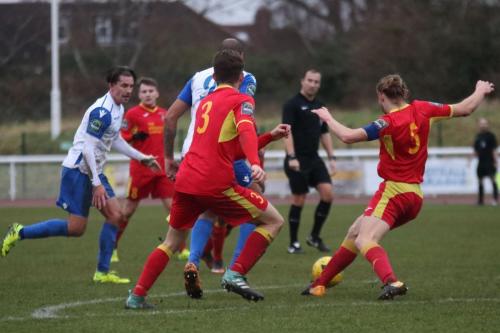 Needhams Keiran Morphew (R) breaks up an Enfield attack