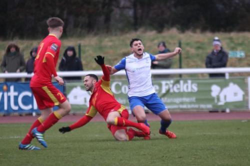 Needhams Luke Ingram (centre) and Jake Dye and Enfields Samir Bihmoutine