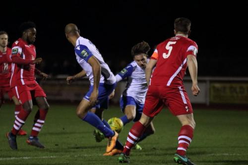 Enfields Sam Youngs (white, R) and Simon Thomas and Tonbridges Sonny Miles (5) and Xavier Vidal