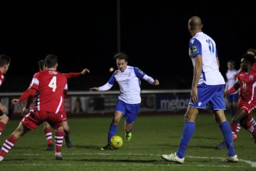 Enfields Sam Youngs runs at the defence