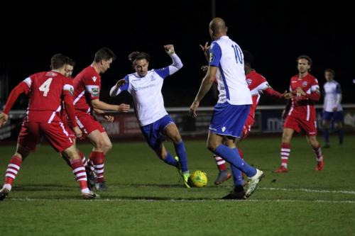 Enfields Sam Youngs runs at the defence but just loses control