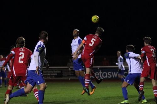 Tonbridges Sonny Miles (5) challenges Simon Thomas