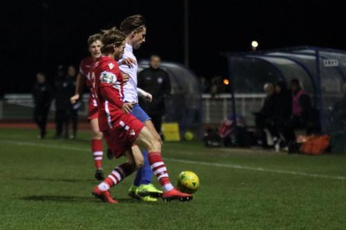 Tonbridges Tom Jelley (red) challenges Sam Youngs