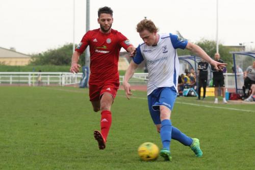 Enfields Aaron Greene (R) and Worthings Alex Parsons35