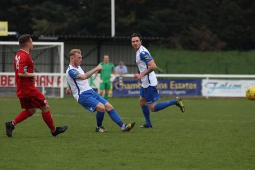 Enfields Ryan Blackman and Matt Johnson (R) and Worthings Reece Myles-Meekums