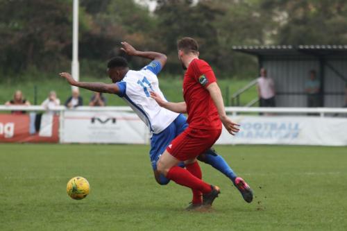 Enfields Ryan Blake (L) and Worthings Aaran Racine