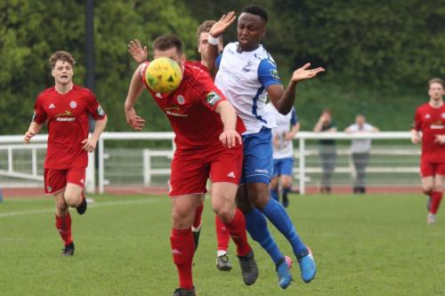 Worthings Aaran Racine (red) and Enfields Ryan Blake