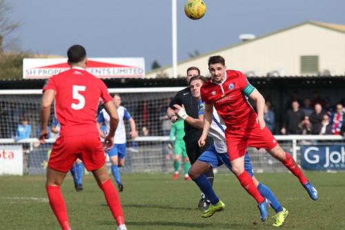 Billericays Danny Waldres (R) wins a header agains Sam Youngs