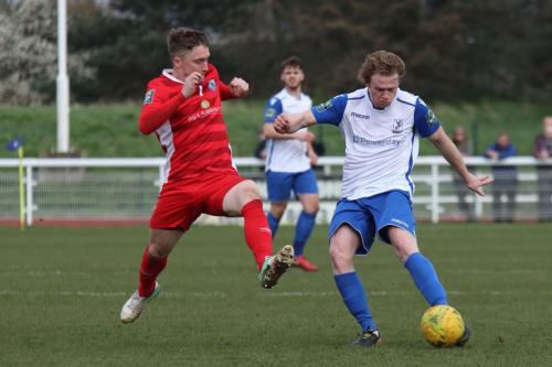 Billericays Jake Robinson (L) and Enfields Aaron Greene