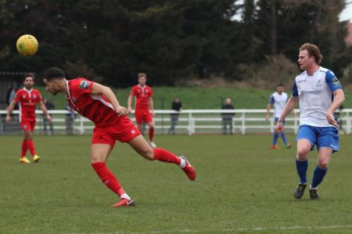 Billericays Joe Kizzi (L) and Enfields Aaron Greene