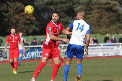 Billericays Joe Kizzi (L) and Enfields Simon Thomas