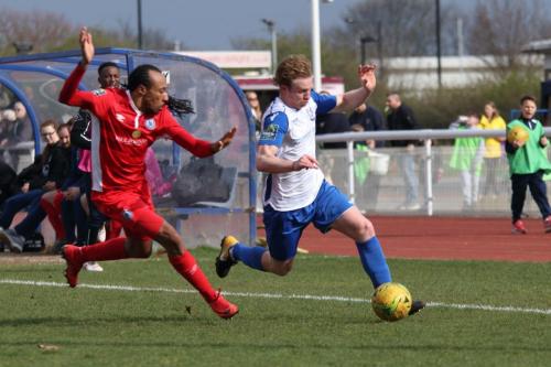 Billericays Ricky Modeste (L) and Enfields Aaron Greene