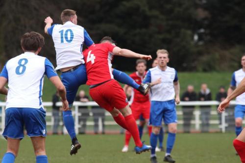 Enfields Brad Wadkins (10) challenges Danny Waldren