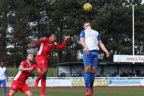 Enfields Dan Rumens (R) challemges Ricky Modeste