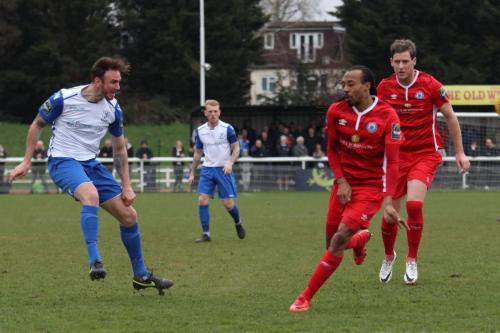 Enfields Matt Johnson and Billericays Ricky Modeste and Jake Robinson (R)