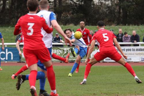 Enfields Sam Youngs tries to curl in a shot