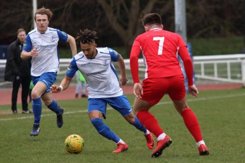 Enfields Tyler Campbell and Mickey Parcell (L) and Billericays Calum Butcher (wearing Ricky Modestes old shirt)