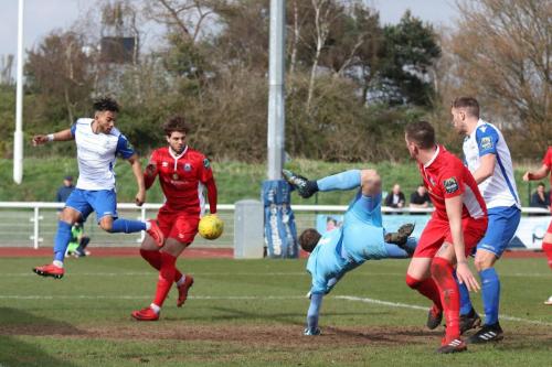 Sam Youngs header beats Billericay keeper Alan Julian but is cleared by the defence
