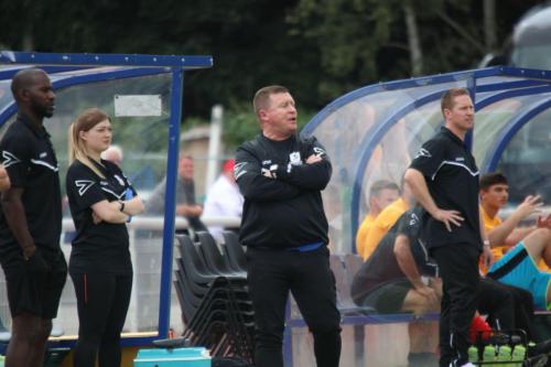 Enfield manager Andy Leese (centre)