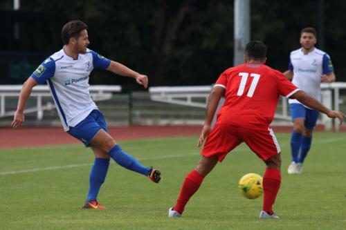 Enfields Drew Roberts (L) and Folkestones Kieron McCann