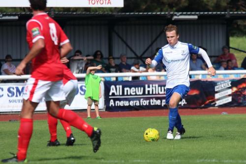 Enfields Mickey Parcell runs at the defence