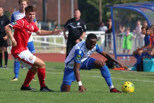 Harlows James Shepherd (L) fouls Enfields Ryan Blake56