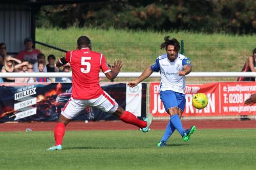 Harlows Stanley Muguo (L) and Enfields Mario Noto