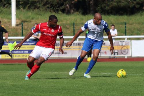 Harlows Stanley Muguo (L) and Enfields Simon Thomas