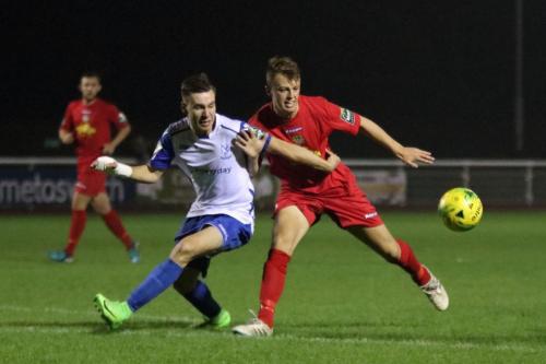 Enfields Ben Ward-Cochrane (L) and Hertfords Daniel Palmer