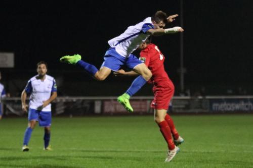 Enfields Ben Ward-Cochrane (white) and Hertfords Daniel Palmer