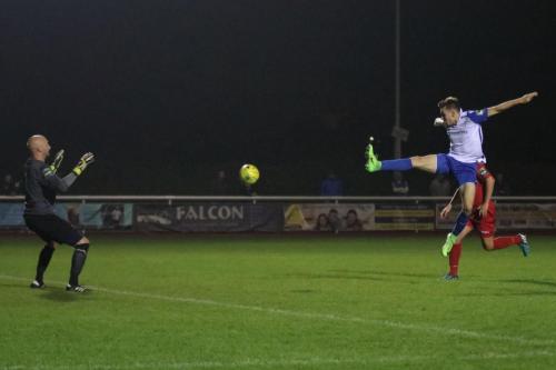 Enfields Ben Ward-Cochrane stretches but cant quite reach a cross from the left wing