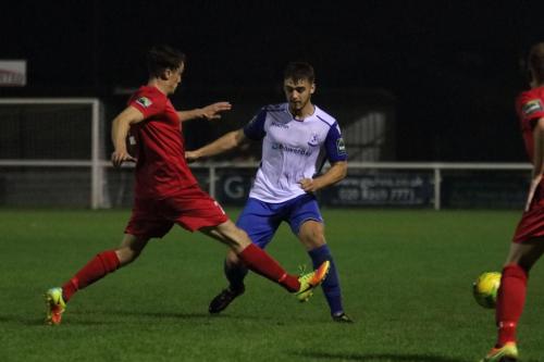 Hertfords Ollie Sharman (L) tackles Dan Rumens