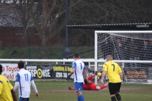 Enfield keeper Joe Wright is beaten by Connor Huntes long-range shot