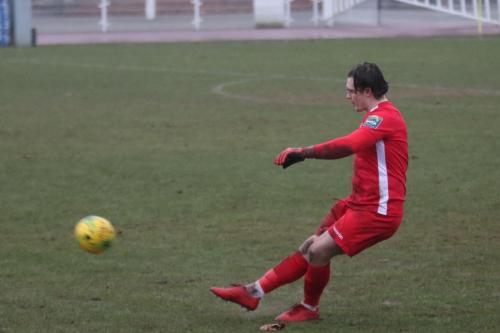 Enfield keeper Joe Wright launches a free kick upfield
